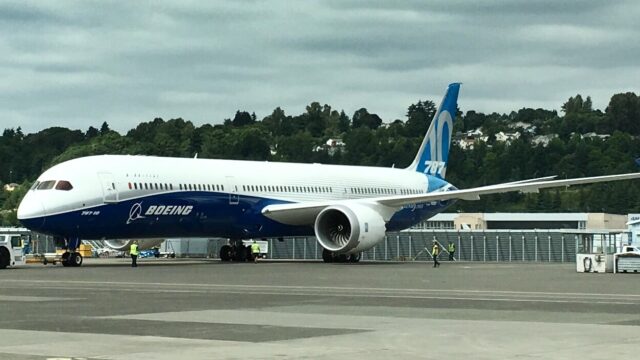 Boeing 787-10 test aircraft in Boeing blue-and-white livery on an airport apron