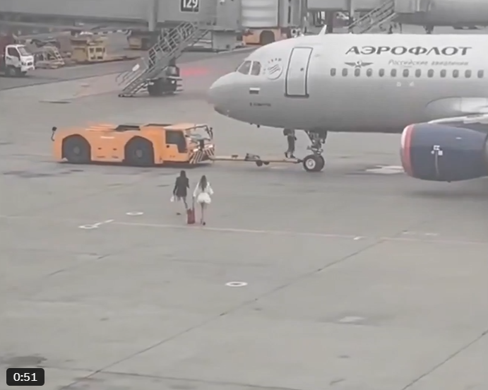 Two Women Chase Departing Aeroflot Plane Across Moscow Airport Tarmac After Missing Flight
